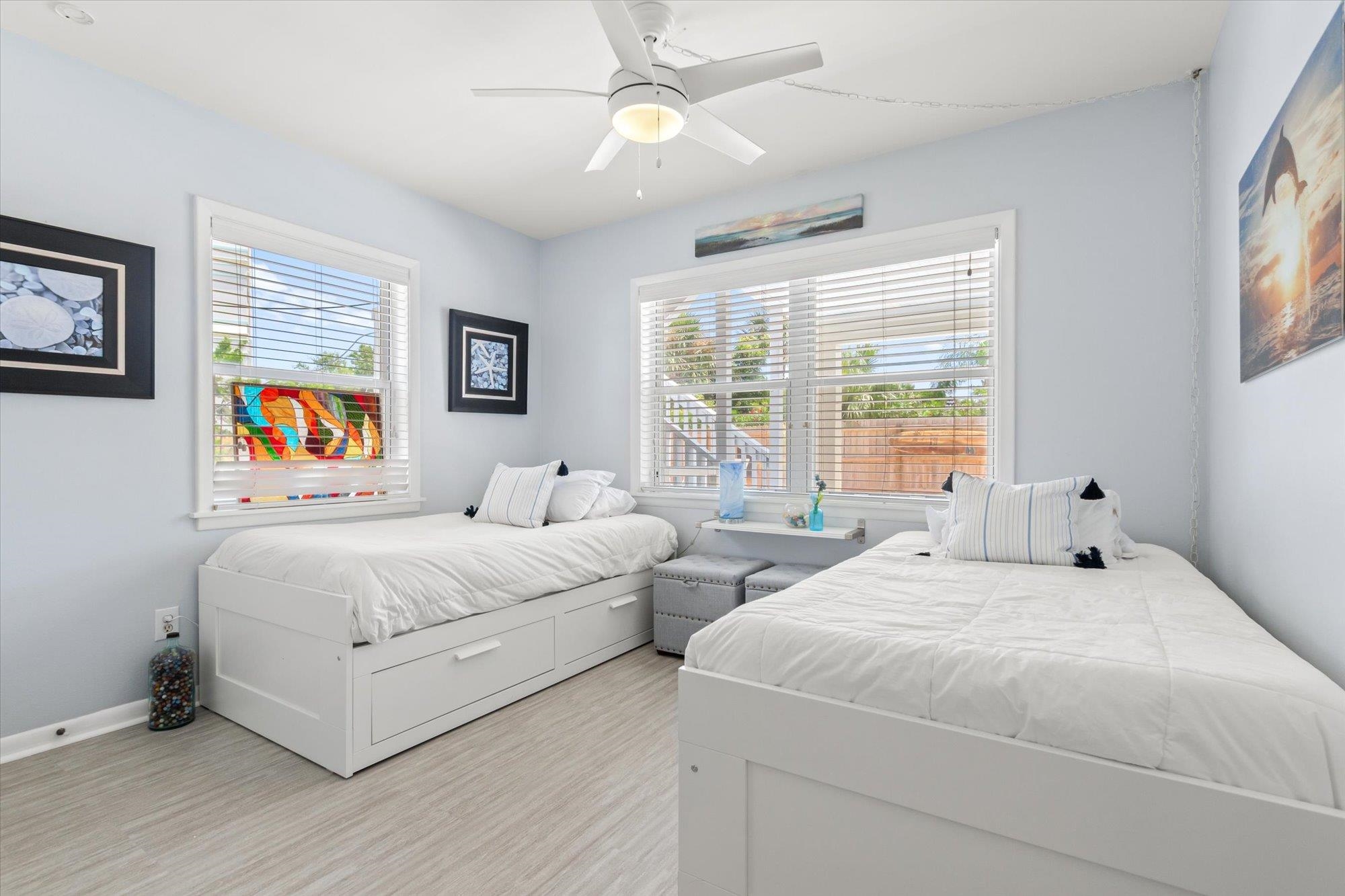 78 Ferrol Road St. Augustine, FL 32084 - Photo 32 of 59 a bedroom with a bed and a large window