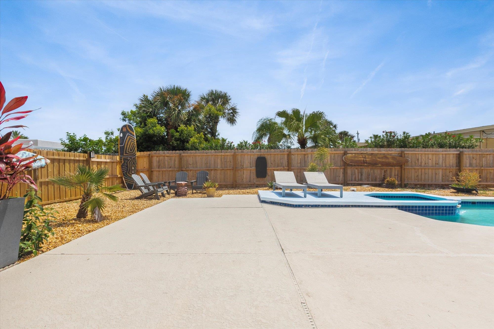 78 Ferrol Road St. Augustine, FL 32084 - Photo 42 of 59 a view of swimming pool with outdoor seating and plants