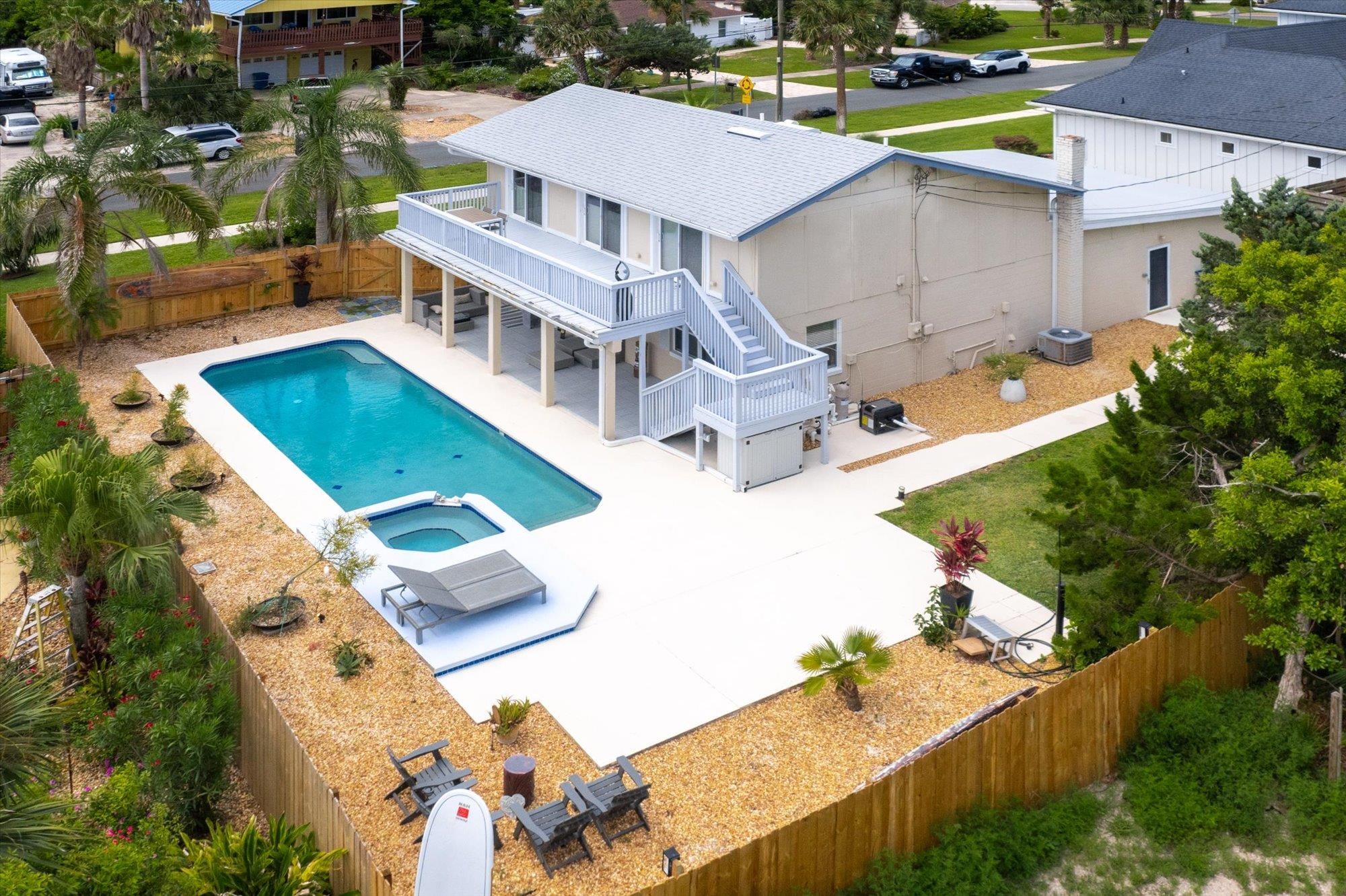 78 Ferrol Road St. Augustine, FL 32084 - Photo 5 of 59 an aerial view of a house with swimming pool and large trees