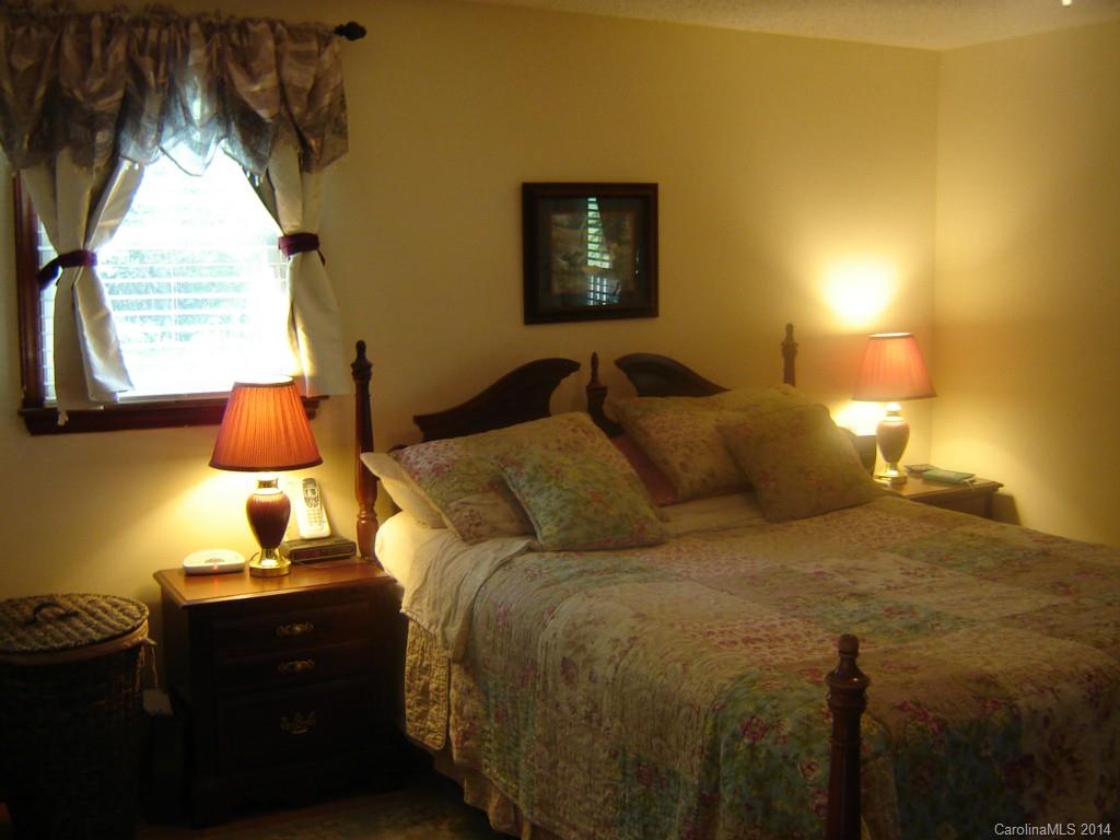 1007 Mills Harris Road Wingate, NC 28174 - Photo 12 of 24 a bedroom with a bed and window