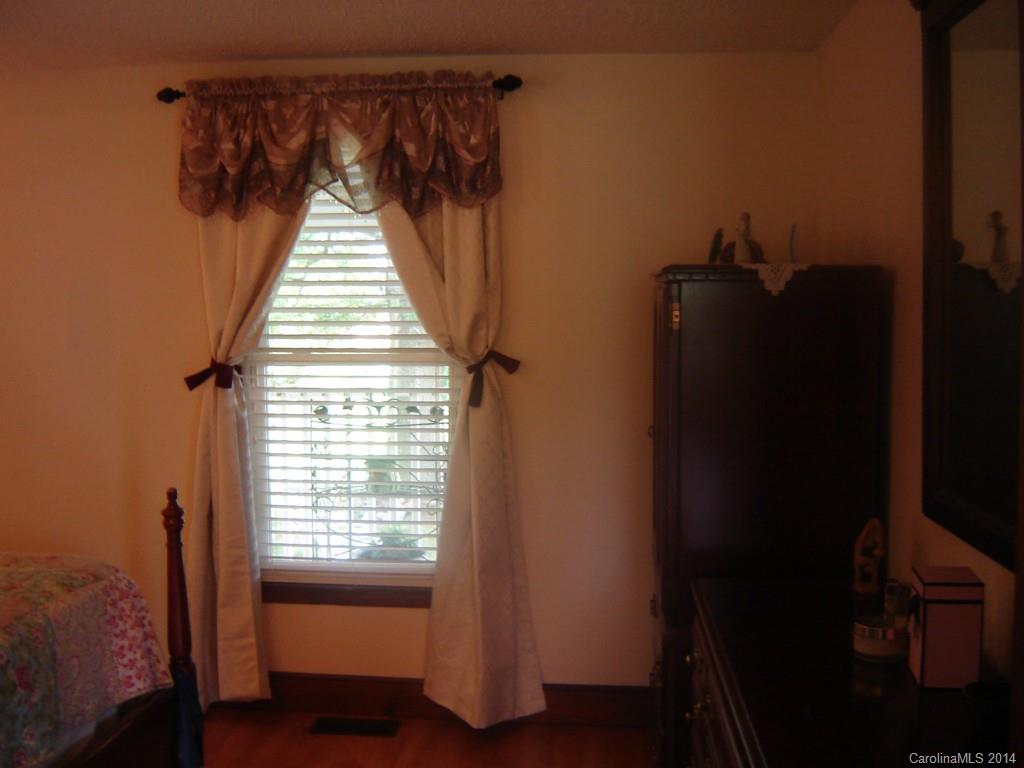 1007 Mills Harris Road Wingate, NC 28174 - Photo 14 of 24 a view of a hallway with windows
