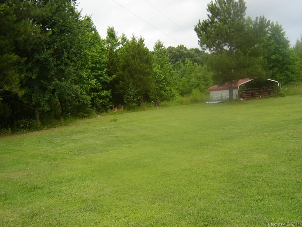 1007 Mills Harris Road Wingate, NC 28174 - Photo 21 of 24 a view of a garden