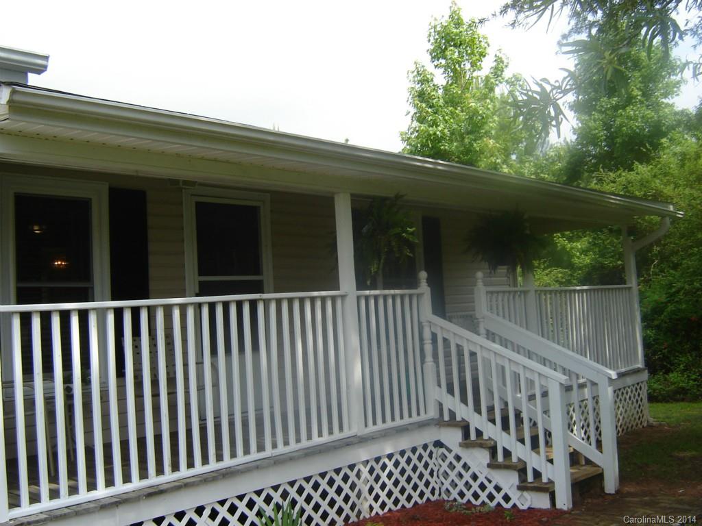 1007 Mills Harris Road Wingate, NC 28174 - Photo 4 of 24 a view of wooden balcony