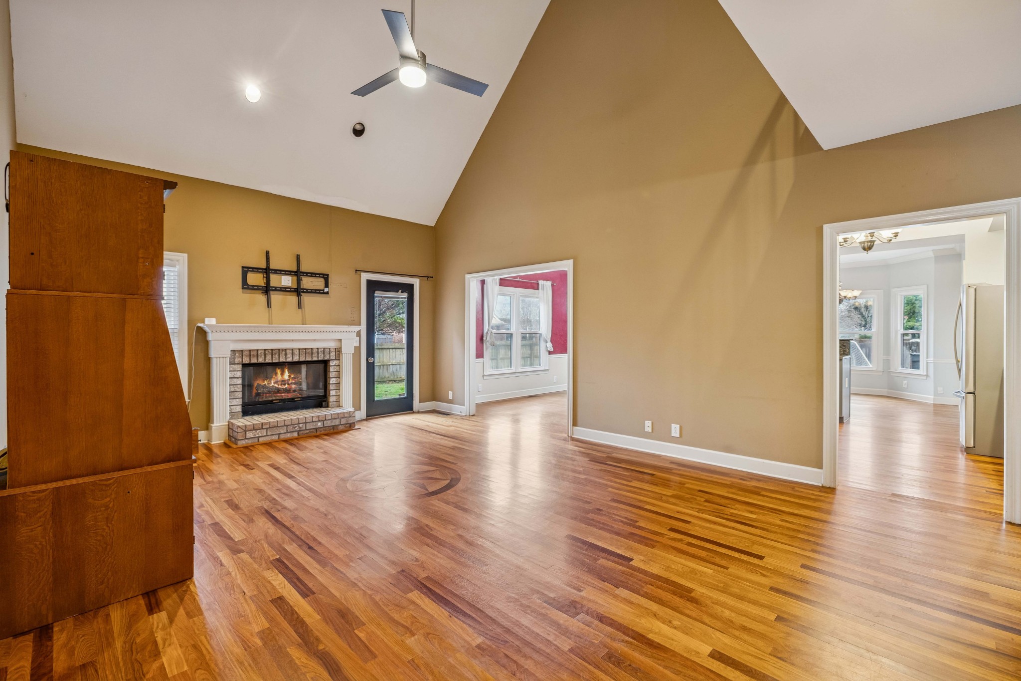 2815 Bowers Lane Murfreesboro, TN 37129 - Photo 25 of 75 a view of a livingroom with wooden floor and a fireplace