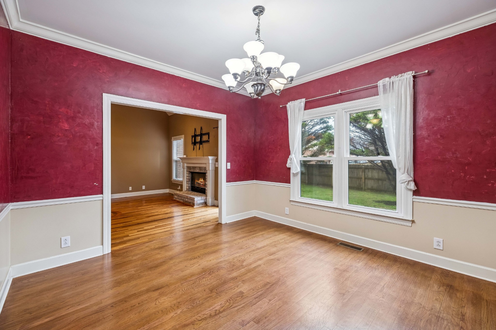 2815 Bowers Lane Murfreesboro, TN 37129 - Photo 36 of 75 a view of an empty room with a window and wooden floor