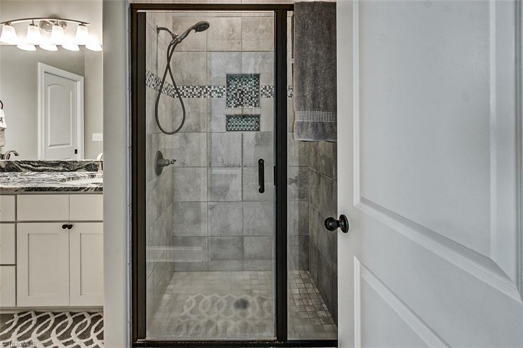 2578 Stutts Road Asheboro, NC 27205 - Photo 14 of 24 Master bath, ceramic tile shower
