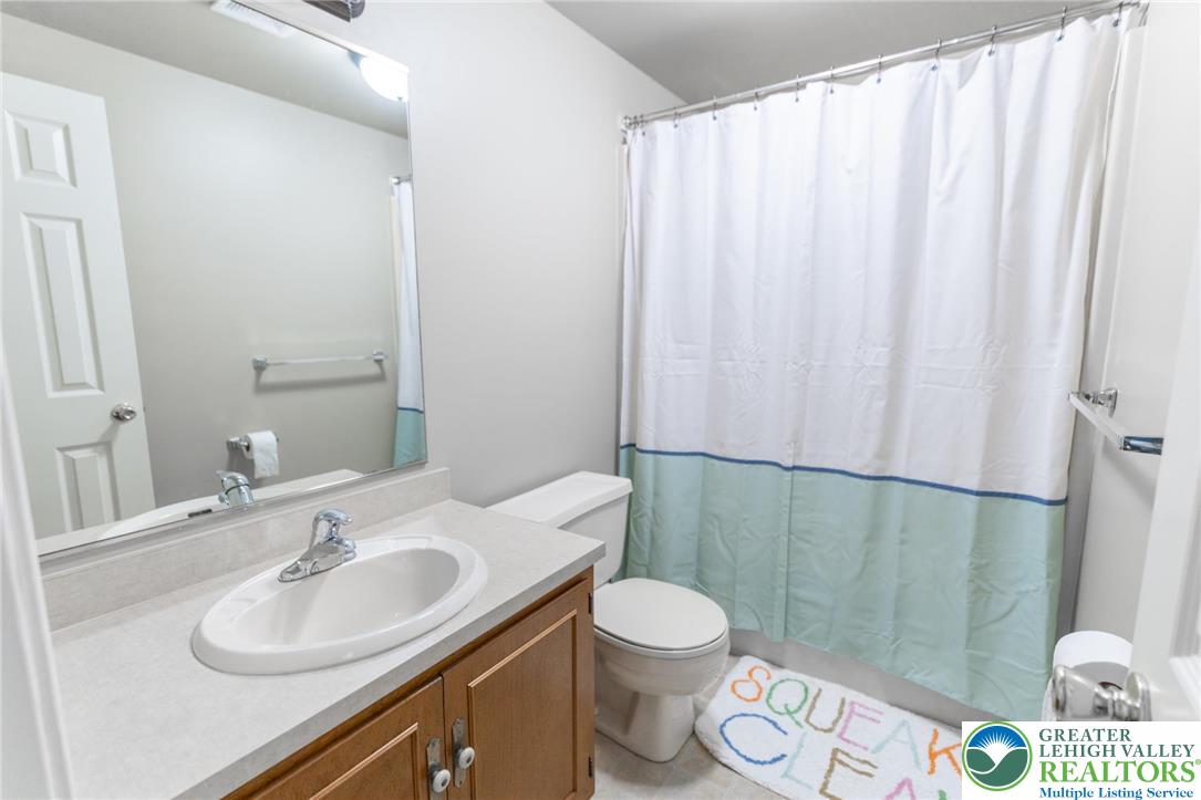 1049 Barnside Road Allentown, PA 18103 - Photo 15 of 19 a bathroom with a sink a toilet and shower