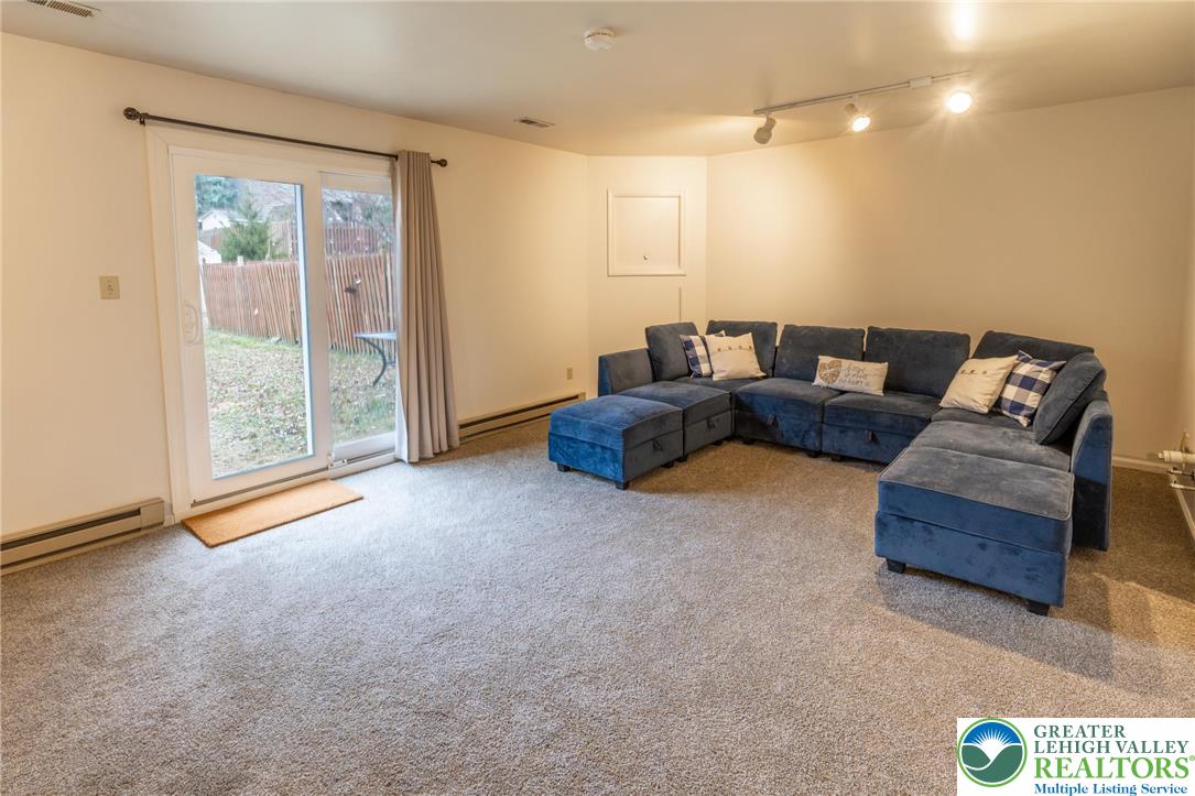 1049 Barnside Road Allentown, PA 18103 - Photo 16 of 19 a living room with furniture and a window