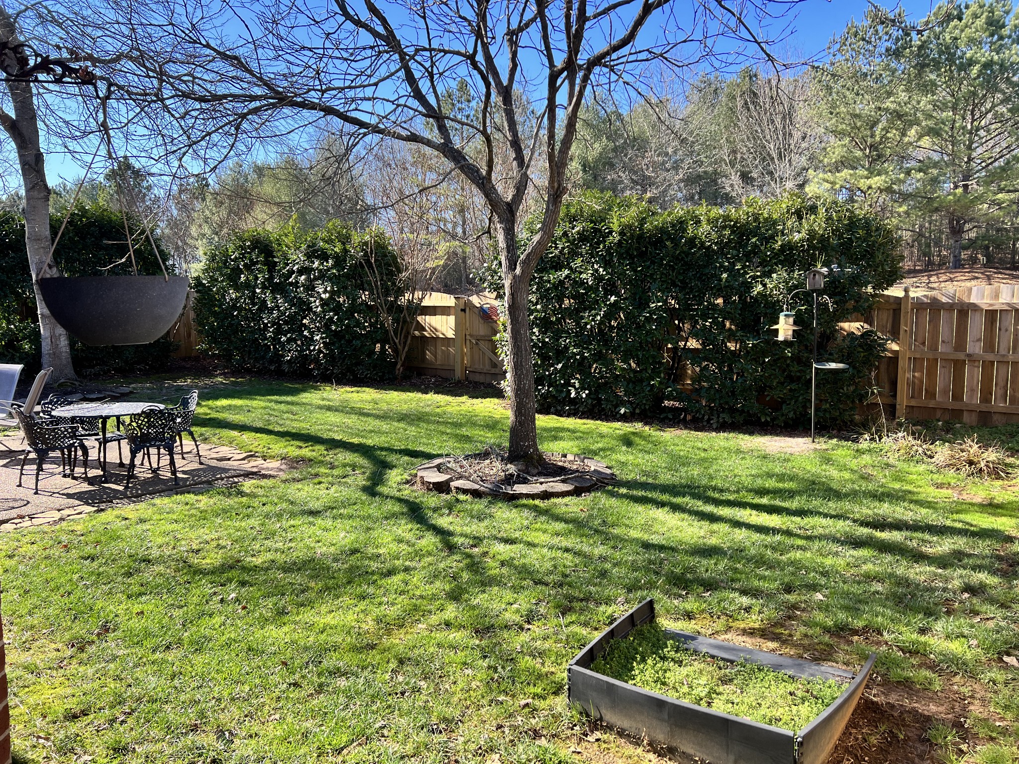 3139 Vera Valley Road Franklin, TN 37064 - Photo 5 of 6 a view of a chair and table in the garden
