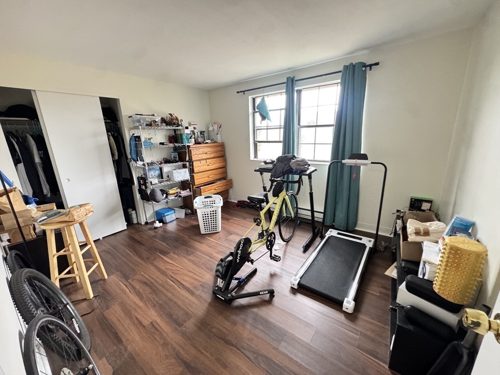 14 A Mayberry Drive, Unit 10 Westborough, MA 01581 - Photo 22 of 25 a view of a room with gym equipment