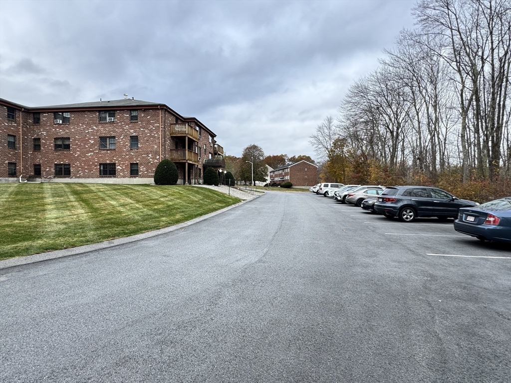 14 A Mayberry Drive, Unit 10 Westborough, MA 01581 - Photo 25 of 25 a view of a car parked in front of a house