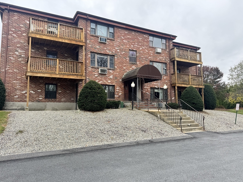 14 A Mayberry Drive, Unit 10 Westborough, MA 01581 - Photo 3 of 25 a front view of a house