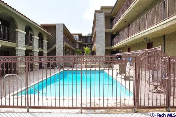 a view of a building with a street