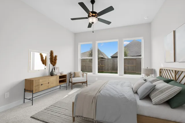 a large house with yard in front of it