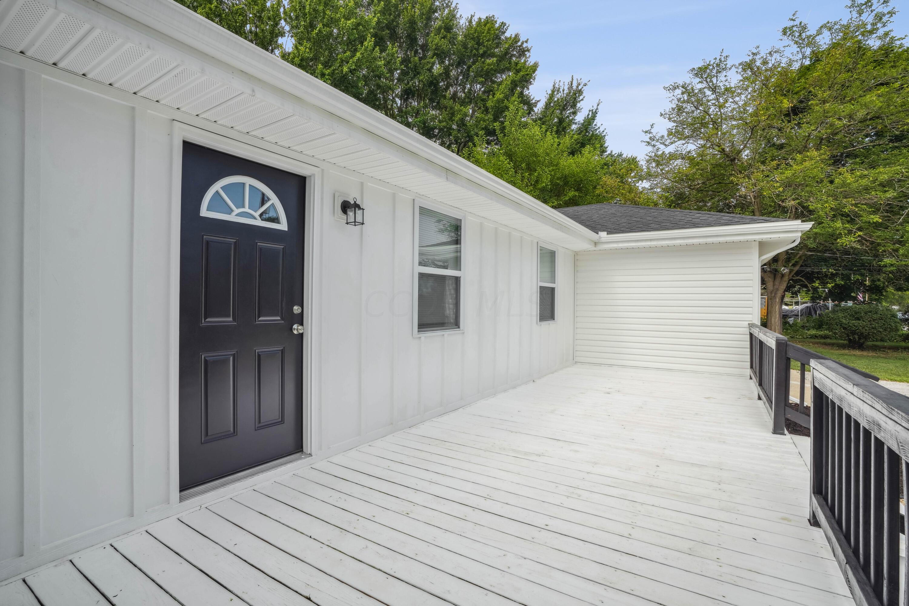 6705 Johnson Road Galloway, OH 43119 - Photo 3 of 30 Huge front porch, perfect for front porch rocking chairs!