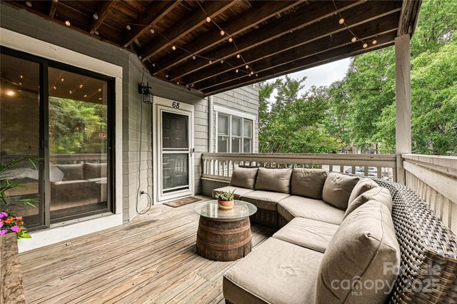 a outdoor living space with furniture and garden view
