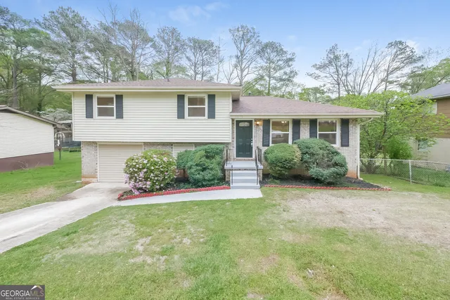 front view of a house with a yard