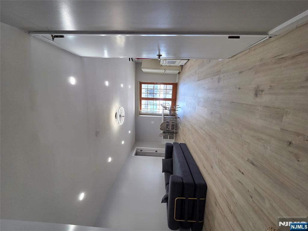 314 Garibaldi Avenue, Unit 1 Lodi, NJ 07644 - Photo 33 of 35 a big room with wooden floor