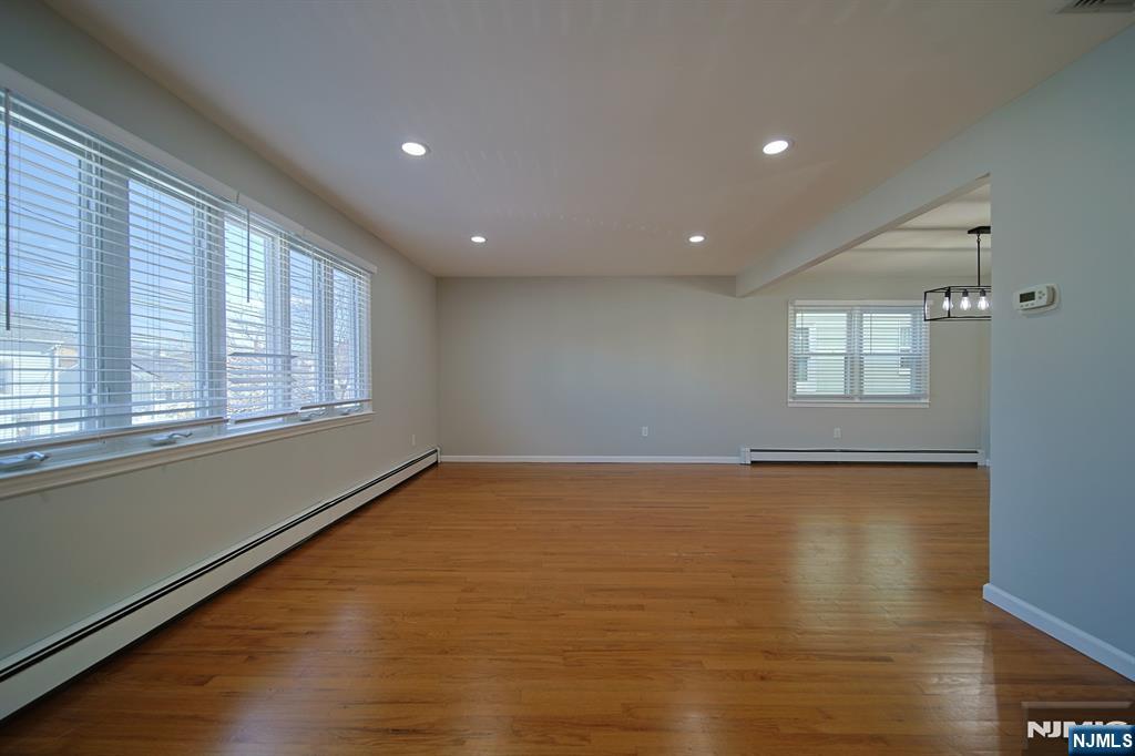 314 Garibaldi Avenue, Unit 1 Lodi, NJ 07644 - Photo 7 of 35 a view of an empty room with a window