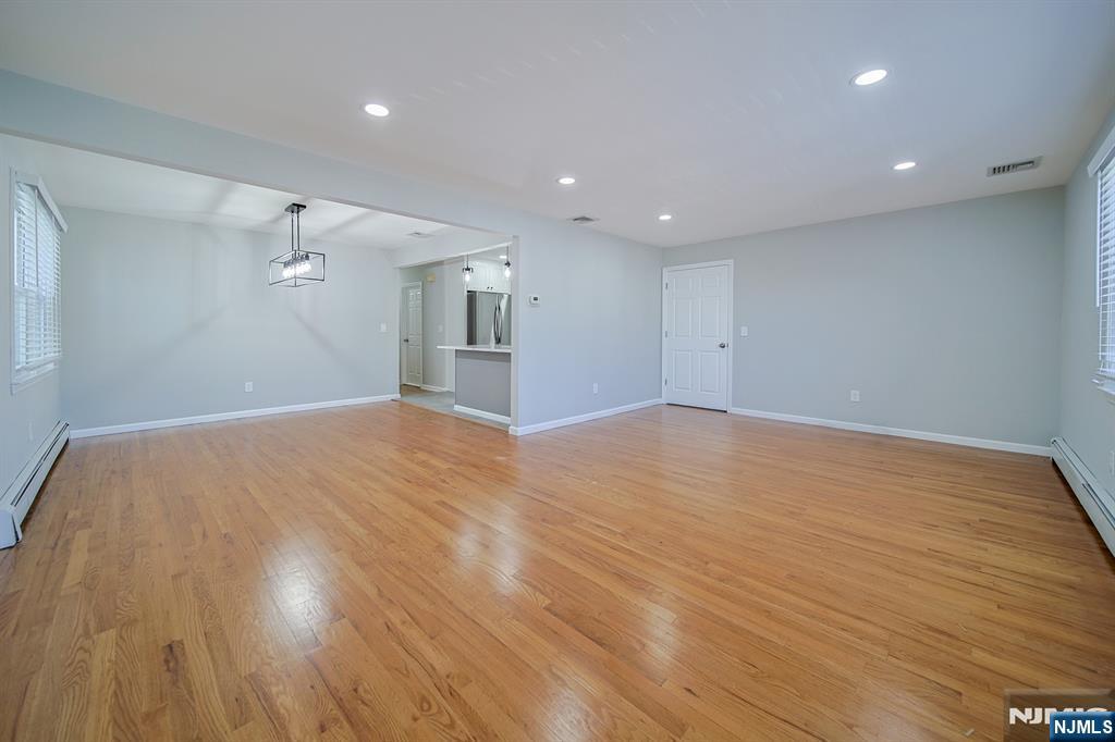 314 Garibaldi Avenue, Unit 1 Lodi, NJ 07644 - Photo 10 of 35 a view of empty room with wooden floor