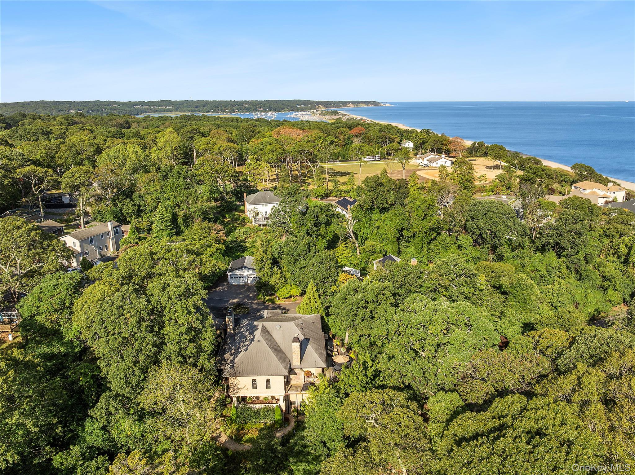 19 Ridge Lane Miller Place, NY 11764 - Photo 26 of 28 Bird's eye view of a heavily wooded area and a large body of water