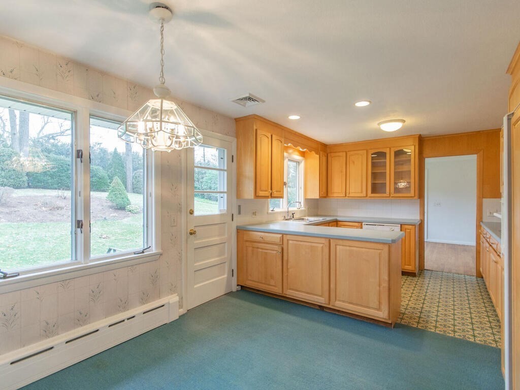 39 Robin Road Longmeadow, MA 01106 - Photo 23 of 42 a kitchen with stainless steel appliances granite countertop a stove and a sink