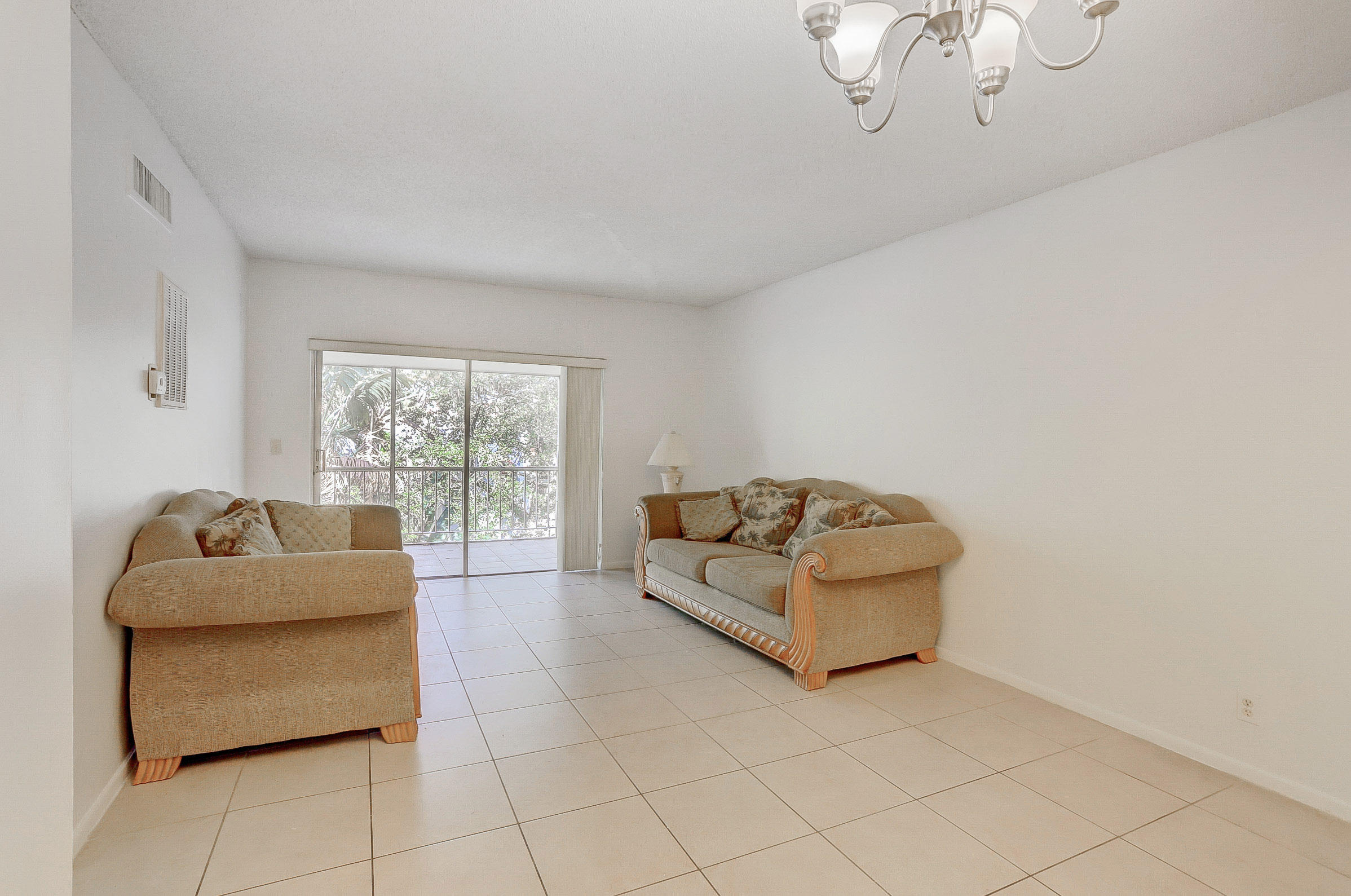 624 Northwest 13th Street, Unit 38 Boca Raton, FL 33486 - Photo 3 of 17 03_img_7397_398_399_400_401