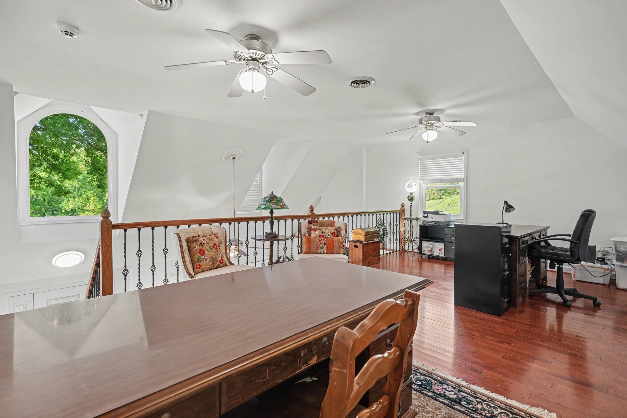5833 Highway 76 East Springfield, TN 37172 - Photo 36 of 66 a view of a dining room and livingroom with furniture wooden floor a chandelier
