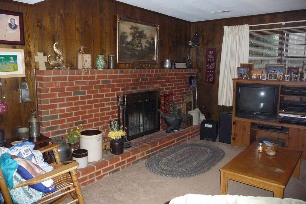 63 Cedarbrook Lane Blue Ridge, VA 24064 - Photo 13 of 14 a living room with furniture and a fireplace