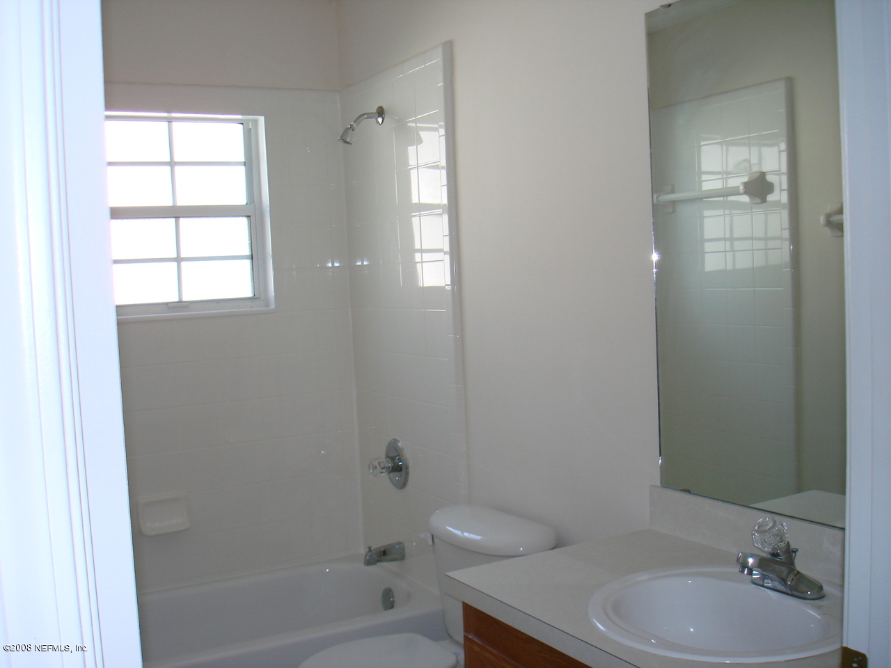 2933 Biloxi Trail Middleburg, FL 32068 - Photo 5 of 8 a bathroom with a sink toilet and shower
