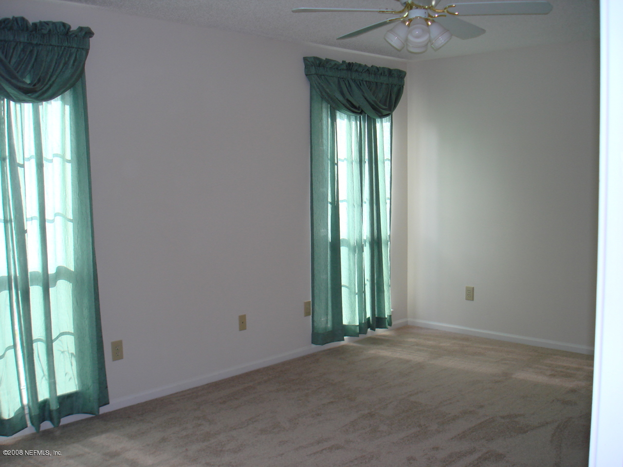 2933 Biloxi Trail Middleburg, FL 32068 - Photo 6 of 8 a view of an entryway with a carpet