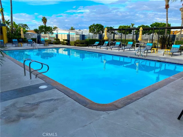 a room with pool table and outdoor seating