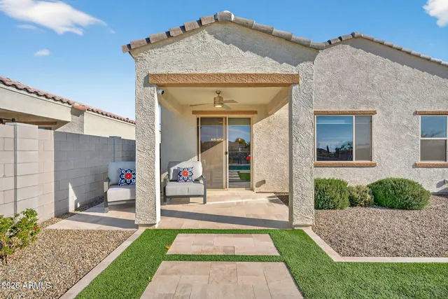 a view of a house with a plants and entryway