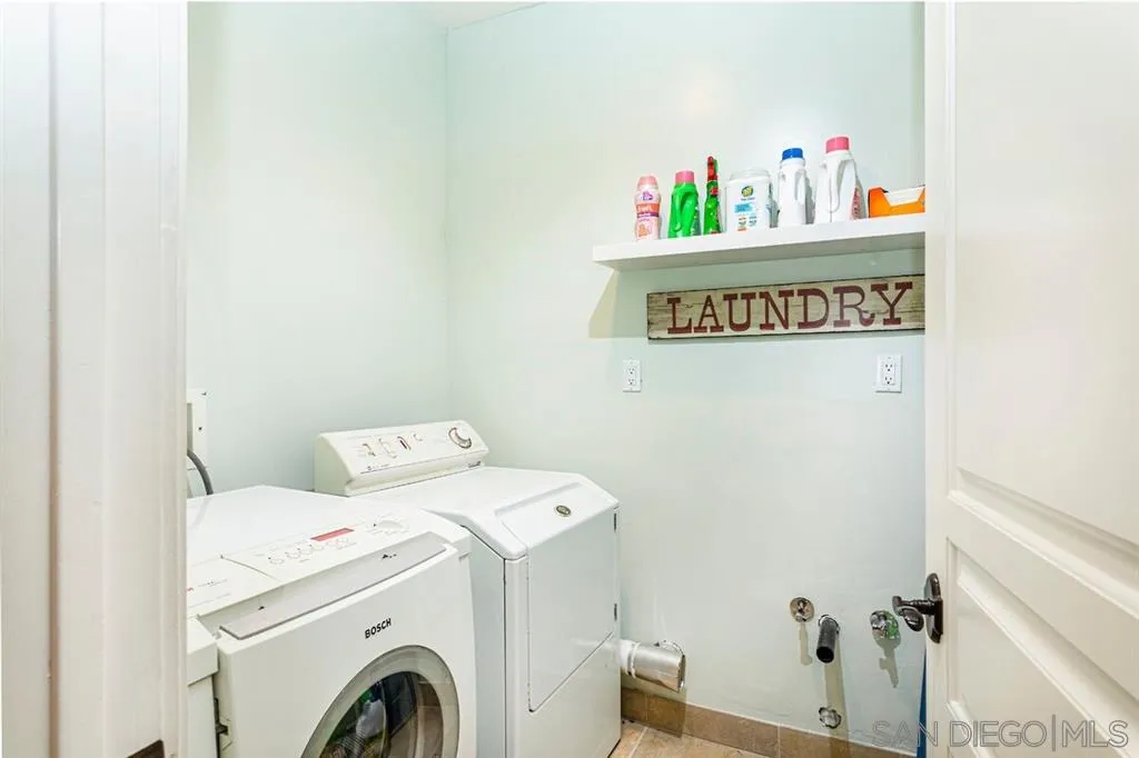 911 4th Street Coronado, CA 92118 - Photo 13 of 18 a utility room with dryer and washer