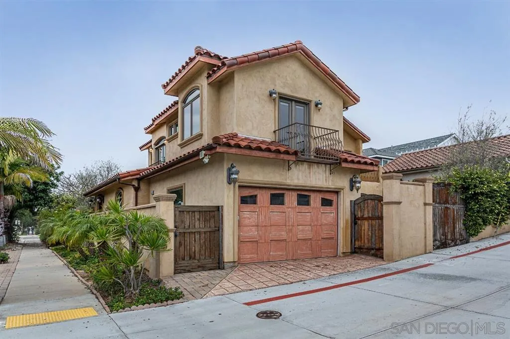 911 4th Street Coronado, CA 92118 - Photo 18 of 18 a front view of a house with a garage