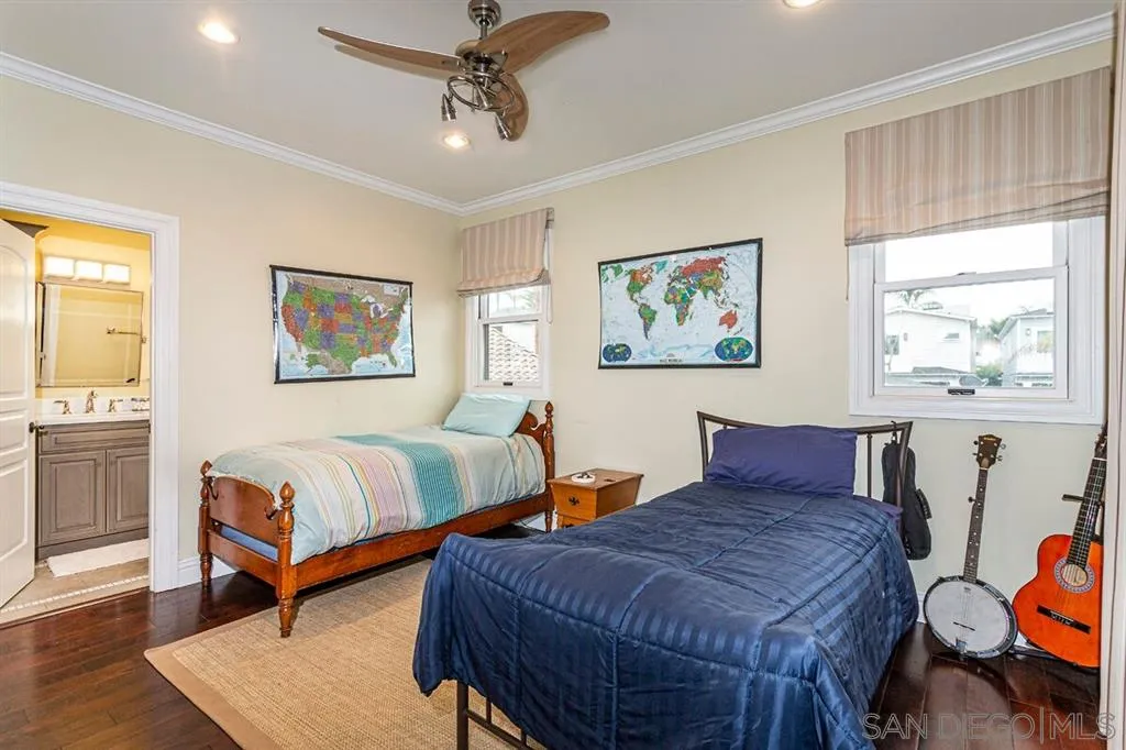 911 4th Street Coronado, CA 92118 - Photo 9 of 18 a bedroom with 2 bed and a window