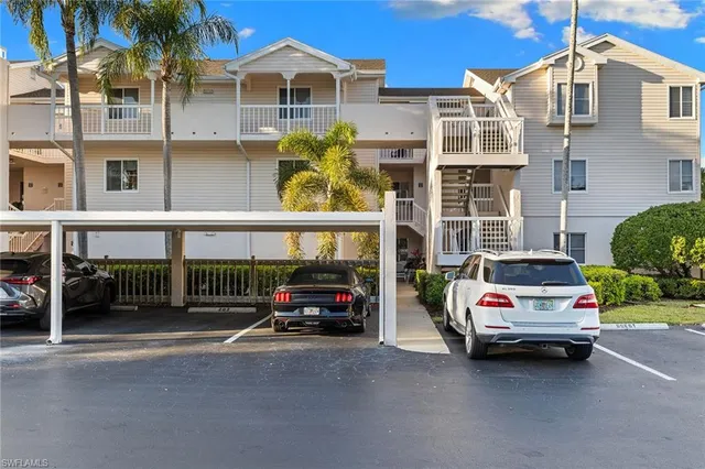 a car parked in front of a house