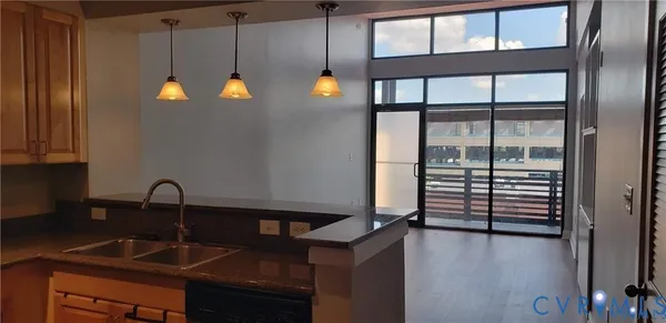 a kitchen with a sink and cabinets