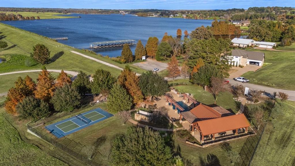 4737 Pine Ridge Court Athens, TX 75752 - Photo 23 of 26 an aerial view of a house with a lake view