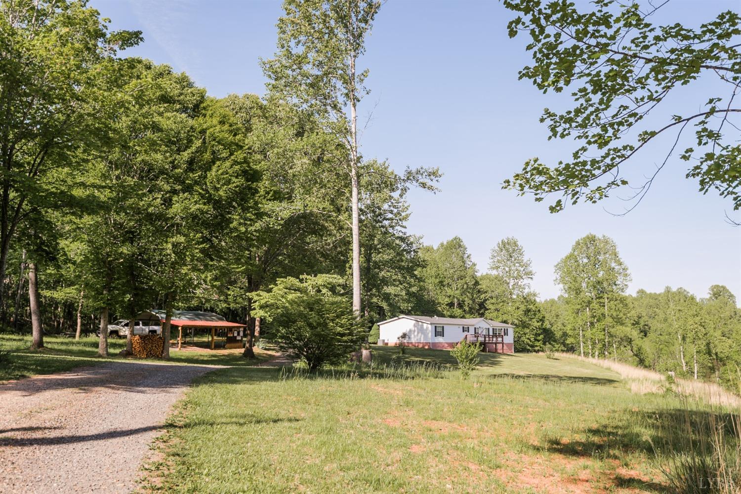 862 Snapps Mill Road Spout Spring, VA 24593 - Photo 28 of 29 a swimming pool with trees in the background