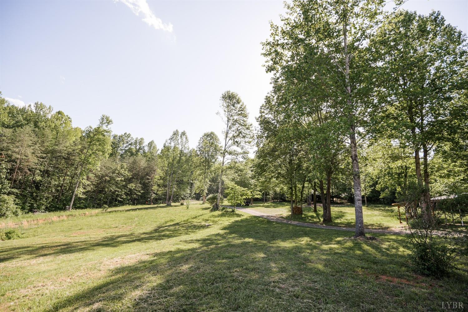 862 Snapps Mill Road Spout Spring, VA 24593 - Photo 4 of 29 a view of outdoor space with trees all around