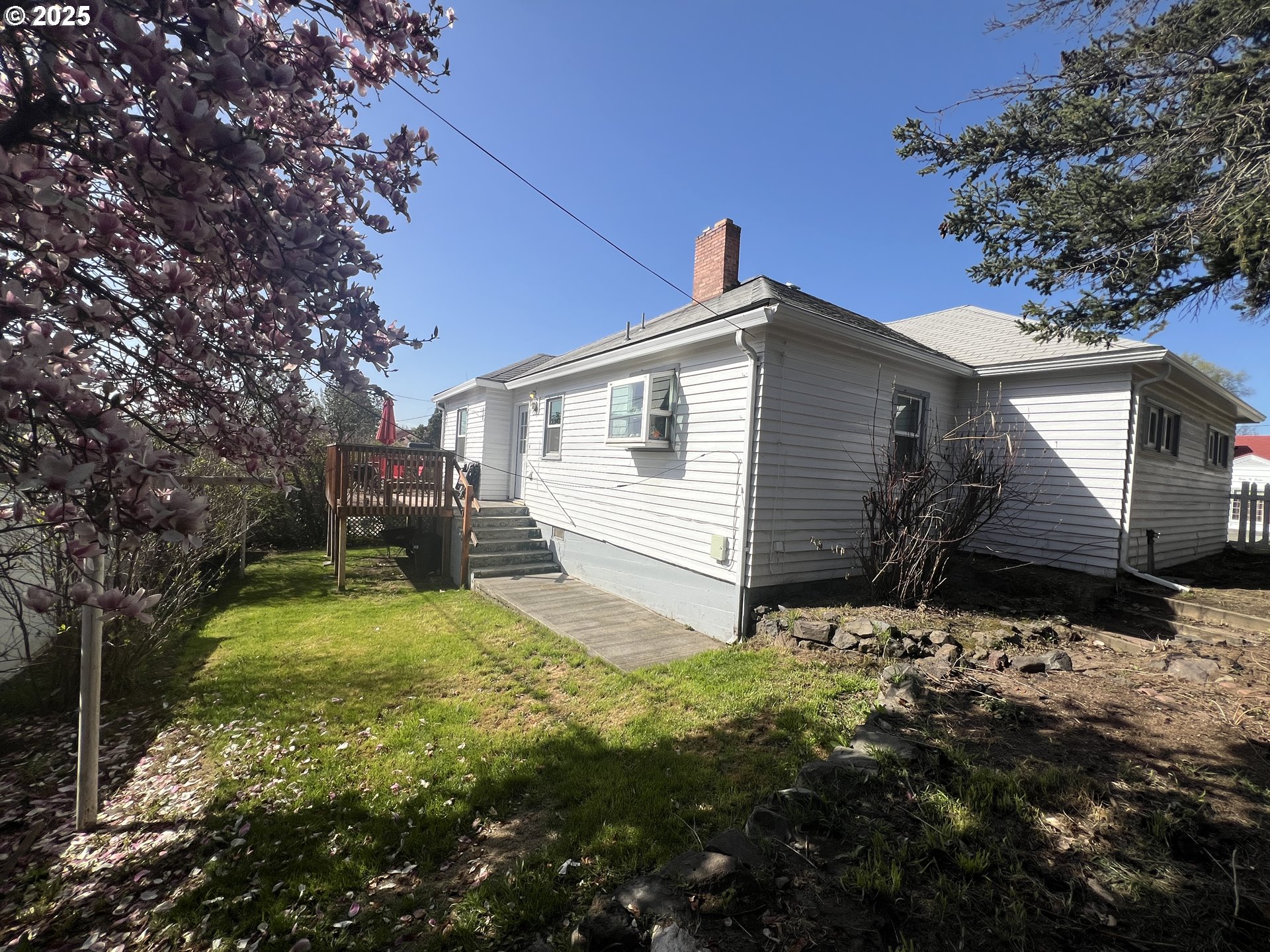 706 Northwest 10th Street Pendleton, OR 97801 - Photo 5 of 19 a view of house with backyard