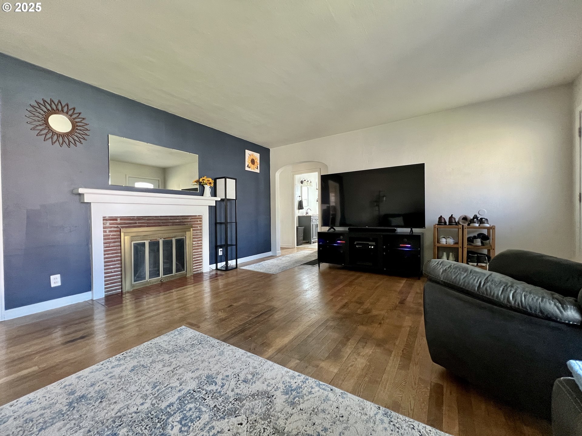 706 Northwest 10th Street Pendleton, OR 97801 - Photo 9 of 19 a living room with furniture and a flat screen tv
