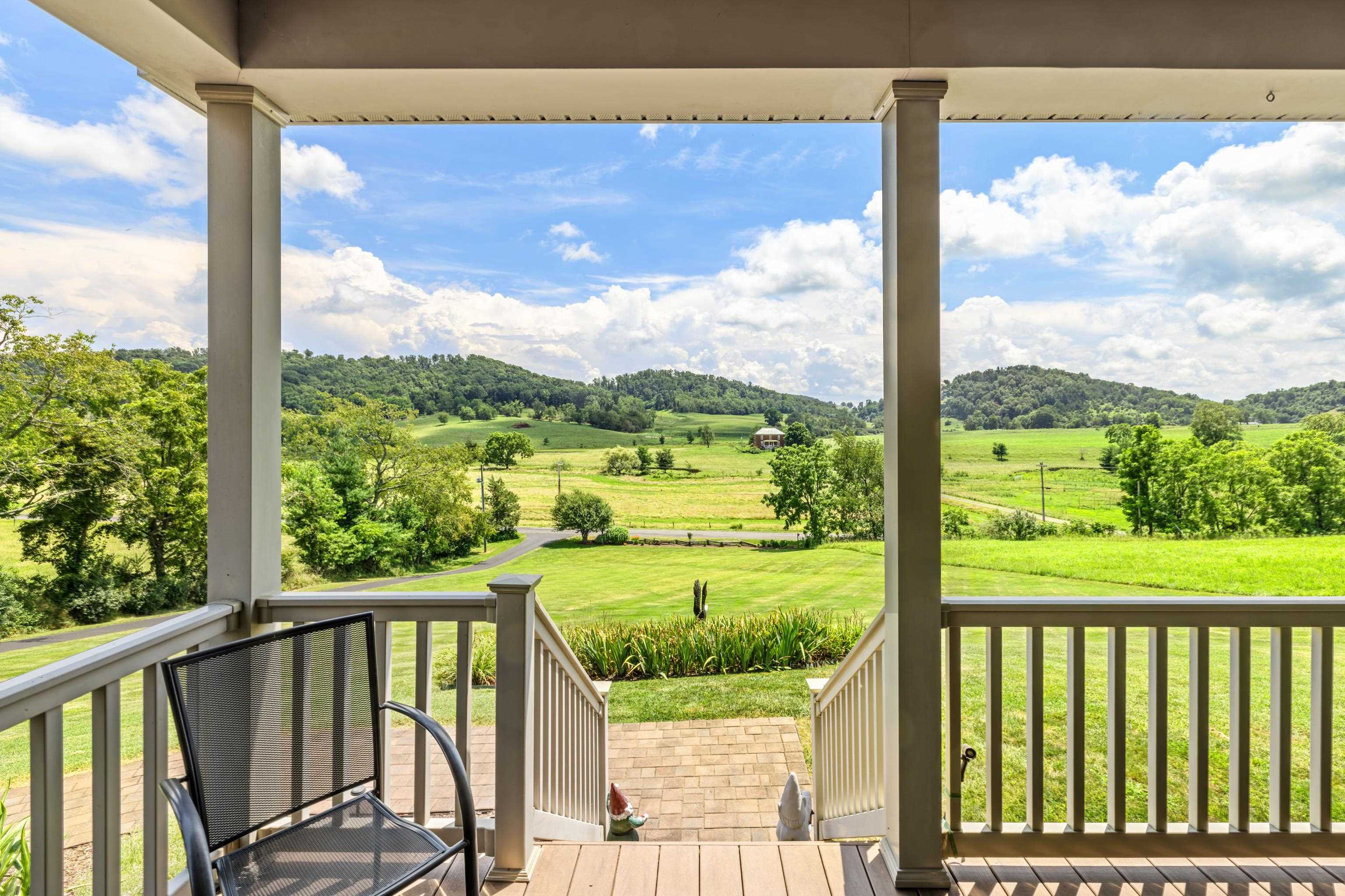 299 Summerdean Road Middlebrook, VA 24459 - Photo 3 of 67 a view of balcony with floor to ceiling windows with wooden floor