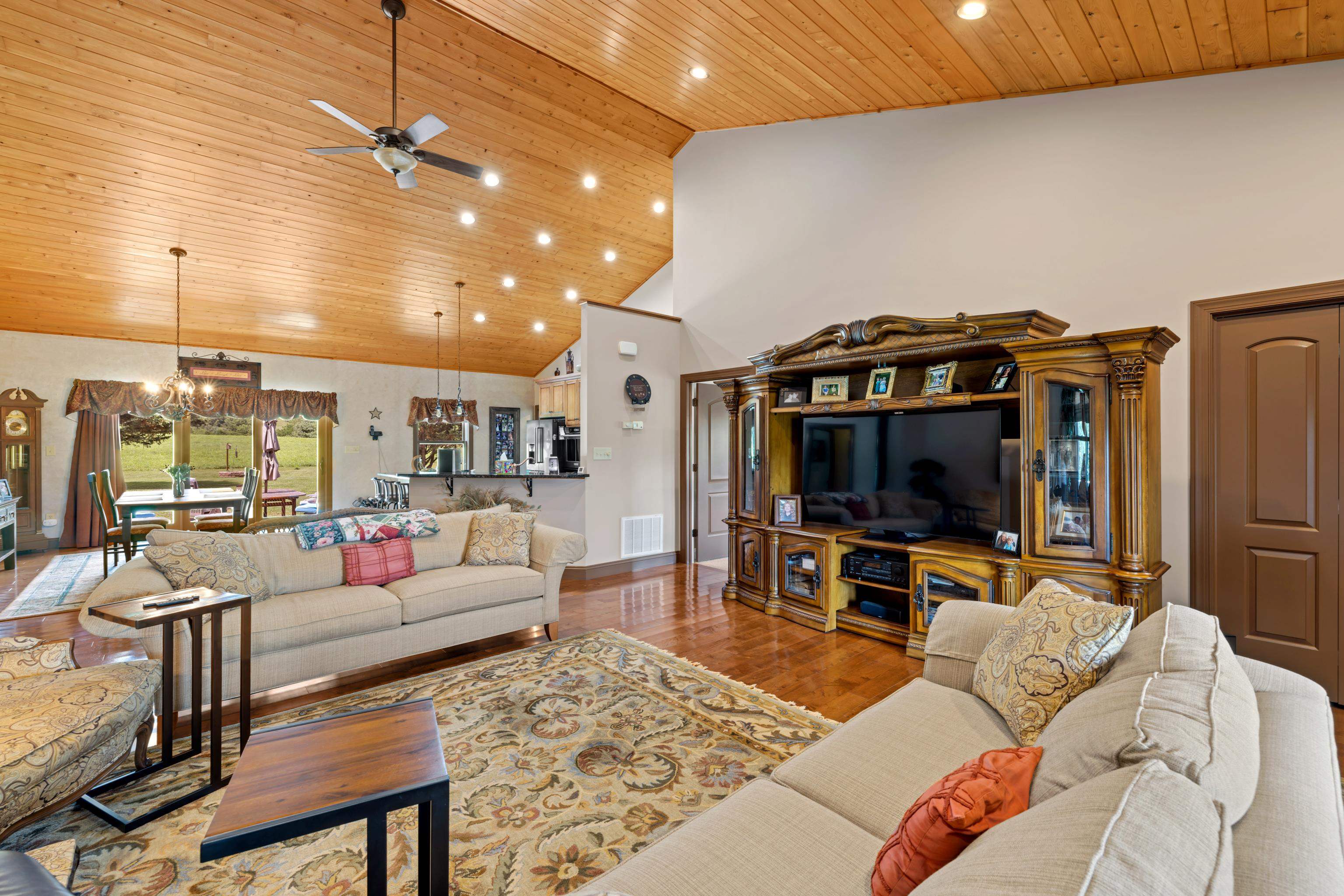 299 Summerdean Road Middlebrook, VA 24459 - Photo 8 of 67 a living room with furniture and a flat screen tv