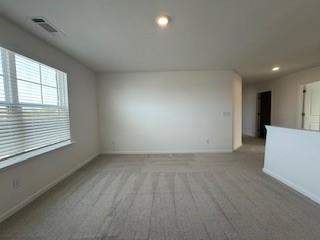 309 Amsterdam Way Hampton, GA 30228 - Photo 20 of 53 an empty room with a window