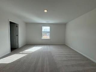 309 Amsterdam Way Hampton, GA 30228 - Photo 24 of 53 an empty room with windows