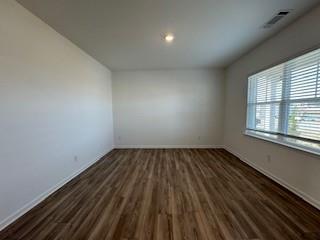 309 Amsterdam Way Hampton, GA 30228 - Photo 3 of 53 a view of an empty room and window