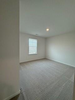 309 Amsterdam Way Hampton, GA 30228 - Photo 35 of 53 an empty room with a window