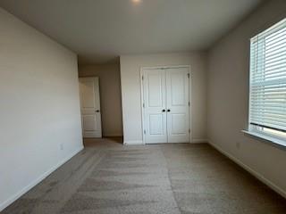 309 Amsterdam Way Hampton, GA 30228 - Photo 36 of 53 an empty room with a window